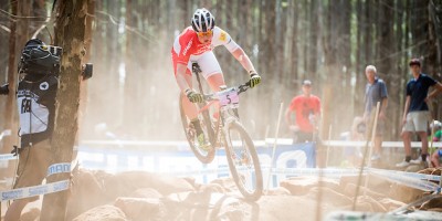 Alexandra-Engen_rocks_jump_acrossthecountry_mountainbike_by_Maasewerd